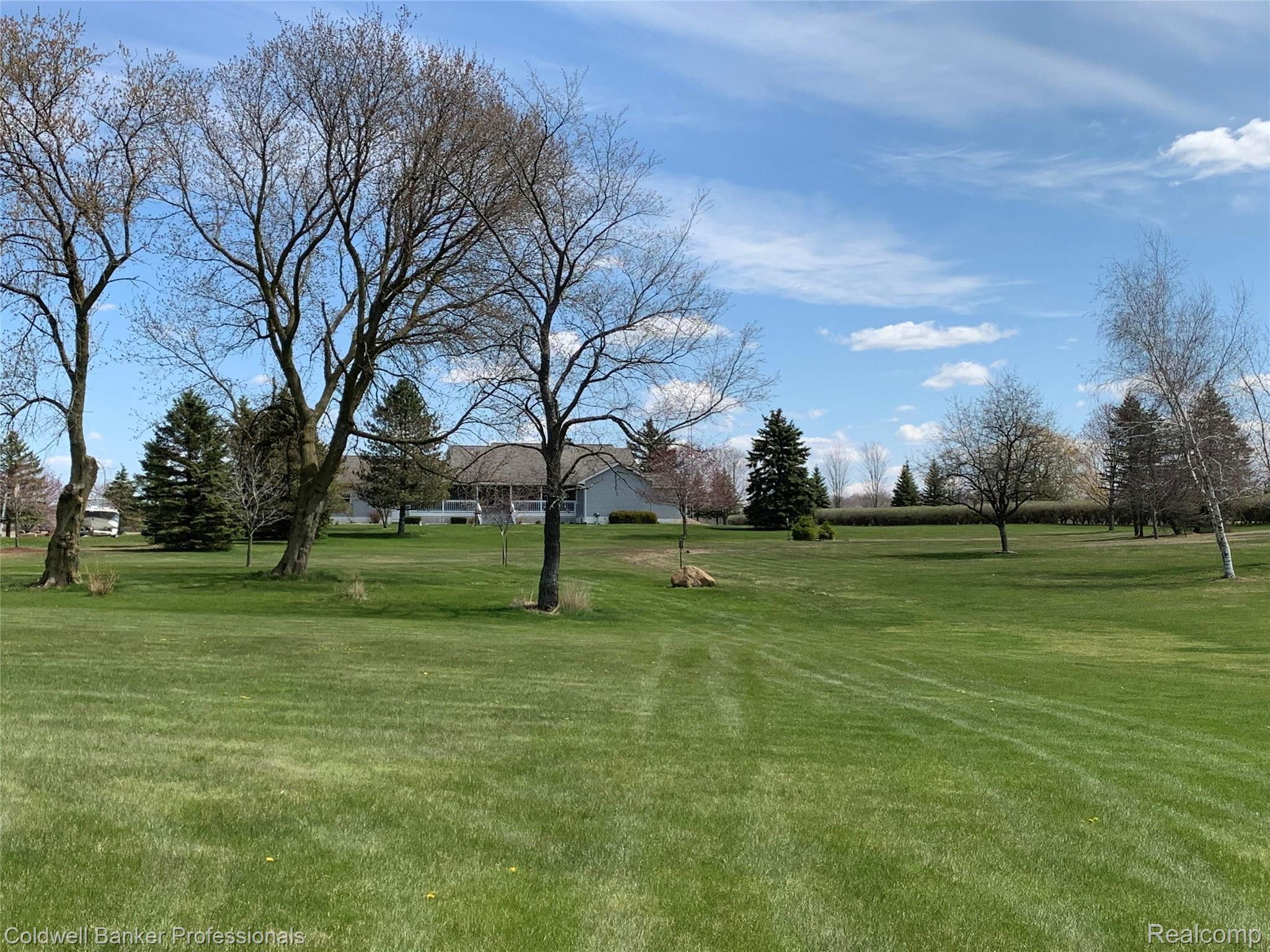 935 North Summers Road Imlay City, MI 48444 - Photo 17 of 73 back yard view of house.jpg