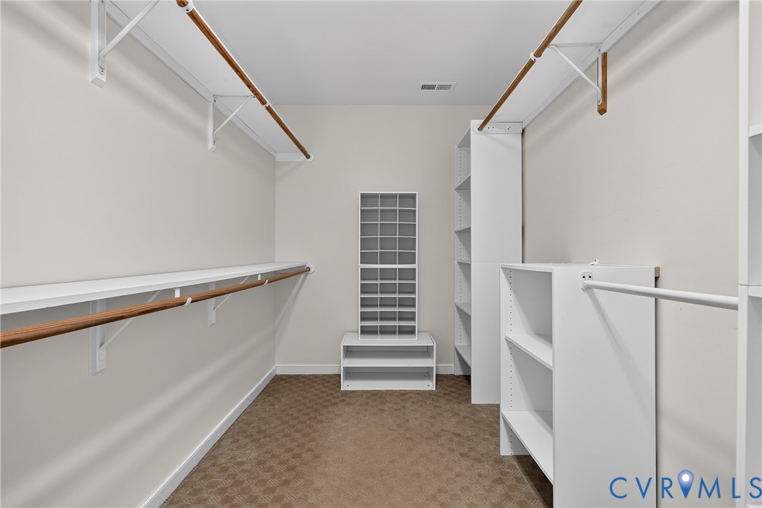 17089 Goshen Road Montpelier, VA 23192 - Photo 39 of 64 Spacious walk-in closet featuring multiple wood-fi
