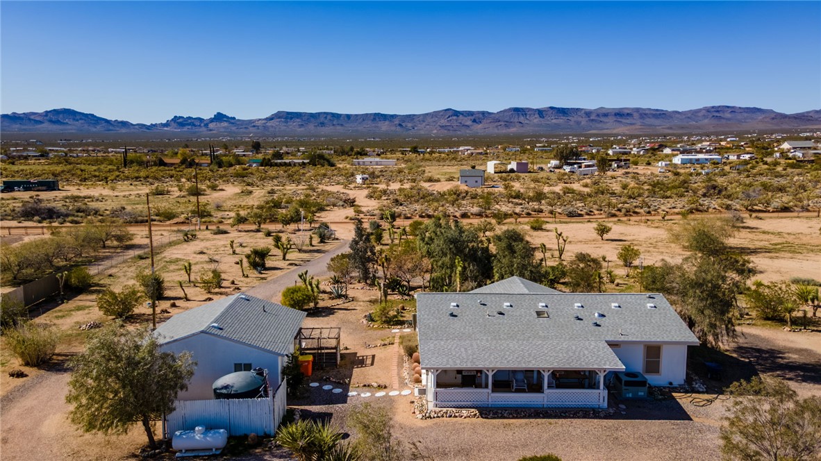 4342 Cordes Road Golden Valley, AZ 86413 - Photo 14 of 39 a view of a town with mountains in the background