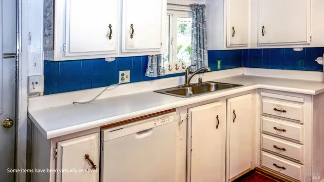 a bedroom with bed and book shelf