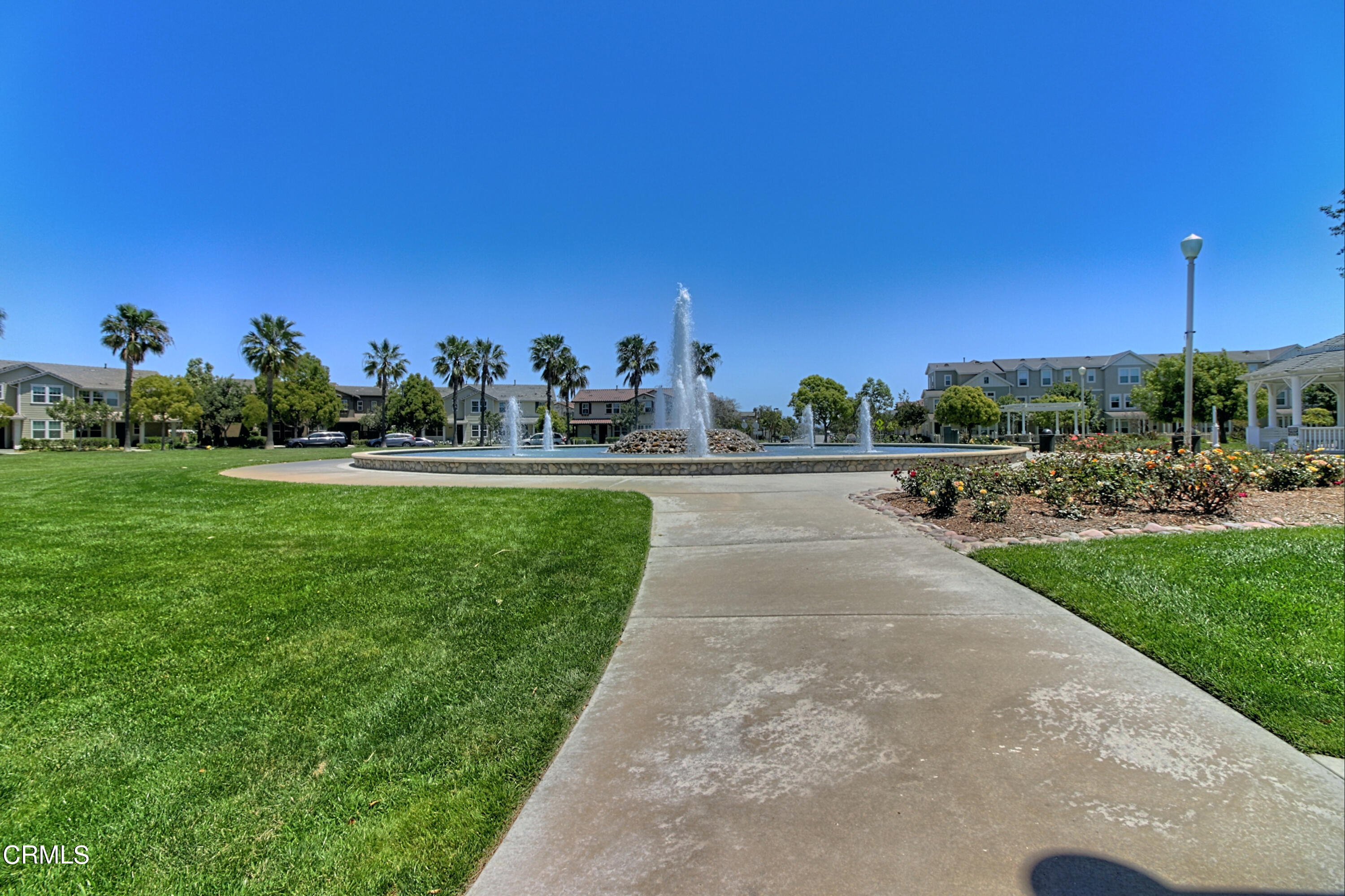 543 Xanadu Way Oxnard, CA 93036 - Photo 14 of 19 a view of a street with a building in the background