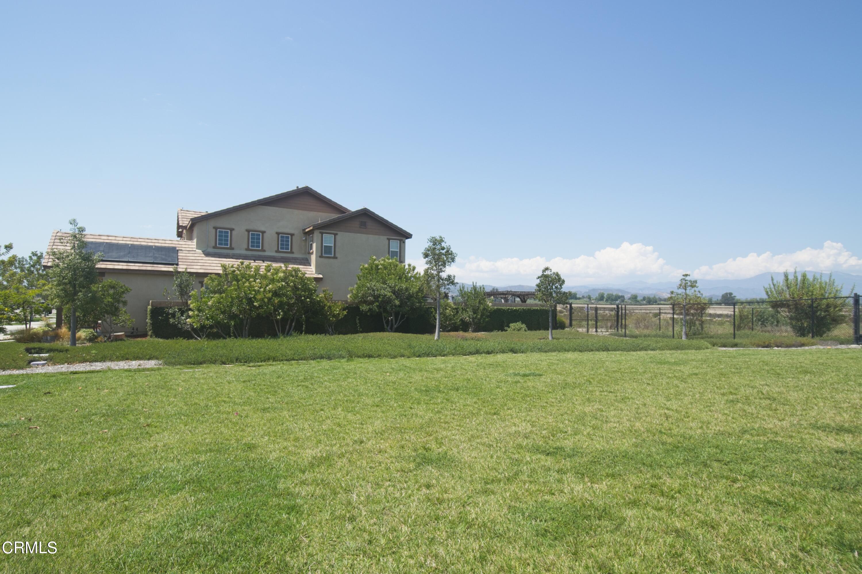 543 Xanadu Way Oxnard, CA 93036 - Photo 6 of 19 a view of a large garden with plants and large trees