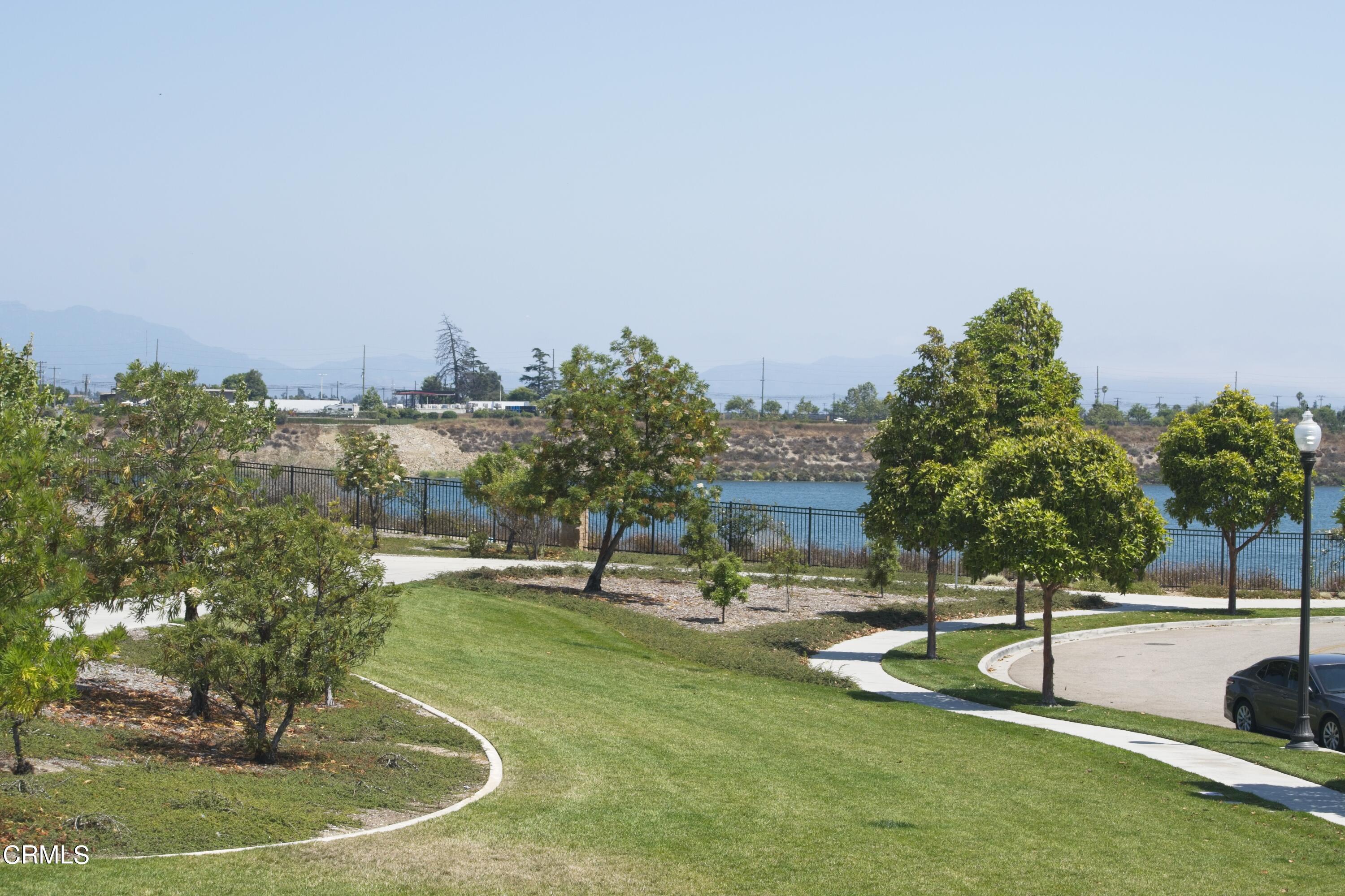 543 Xanadu Way Oxnard, CA 93036 - Photo 8 of 19 a swimming pool with outdoor seating and trees