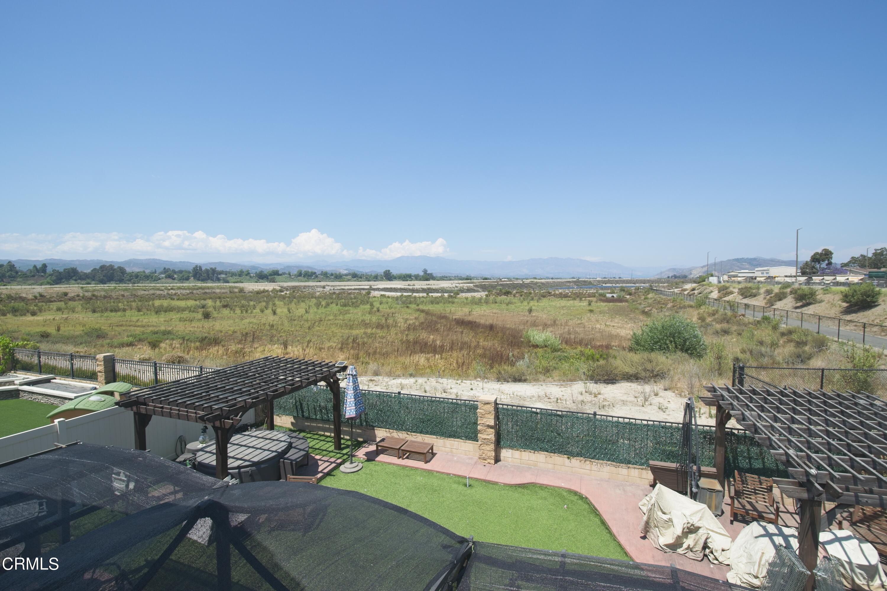 543 Xanadu Way Oxnard, CA 93036 - Photo 10 of 19 a view of a terrace with lawn chairs