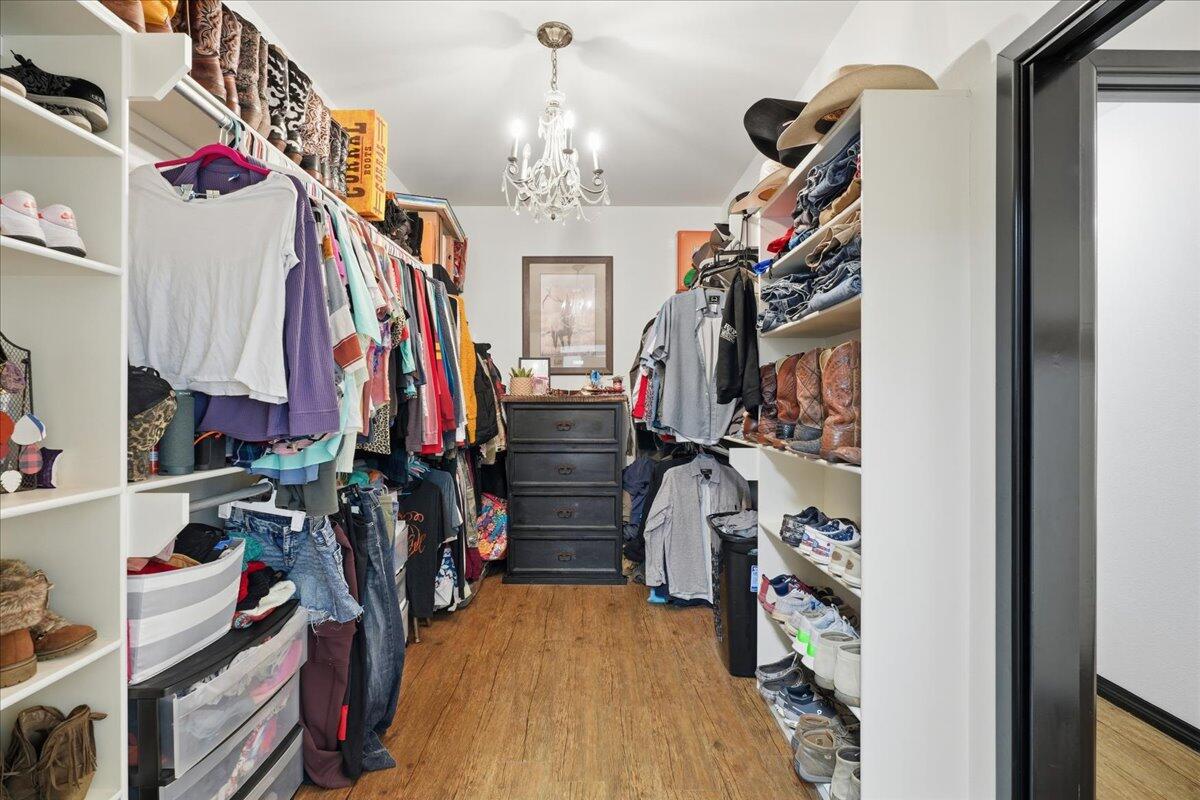 3013 111th Street Lubbock, TX 79423 - Photo 23 of 37 a view of a closet with storage