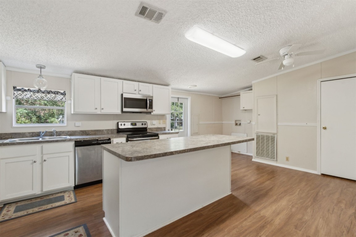85323 Rose Marie Road Yulee, FL 32097 - Photo 4 of 42 plenty of room to sit at this island