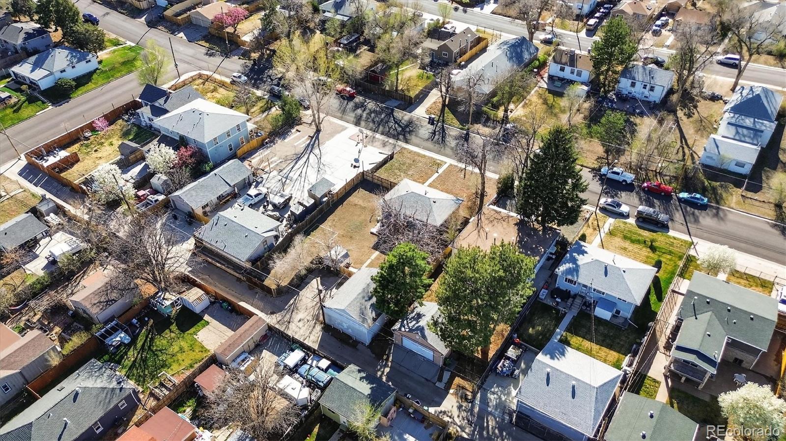 934 Linley Court Denver, CO 80204 - Photo 14 of 17 an aerial view of a residential apartment building with parking