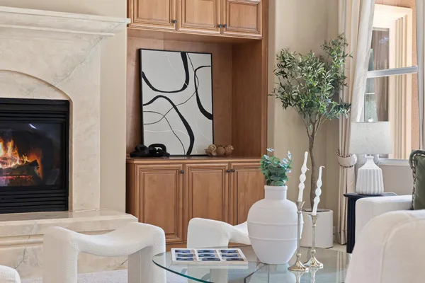 a view of a dining room with furniture and window