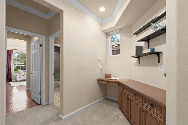 a spacious bedroom with a balcony a bed and a shower