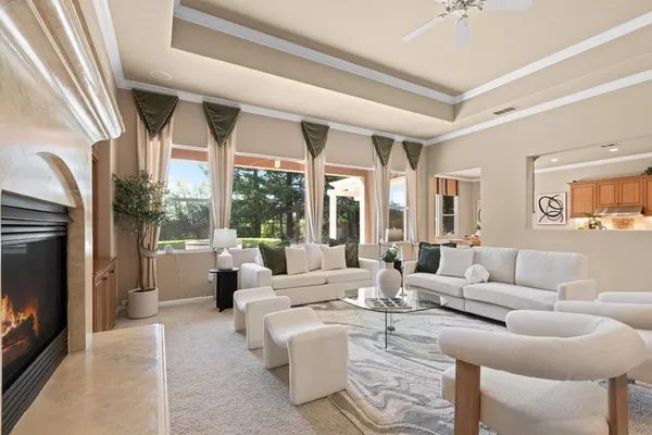 a view of a dining room with furniture window and outside view