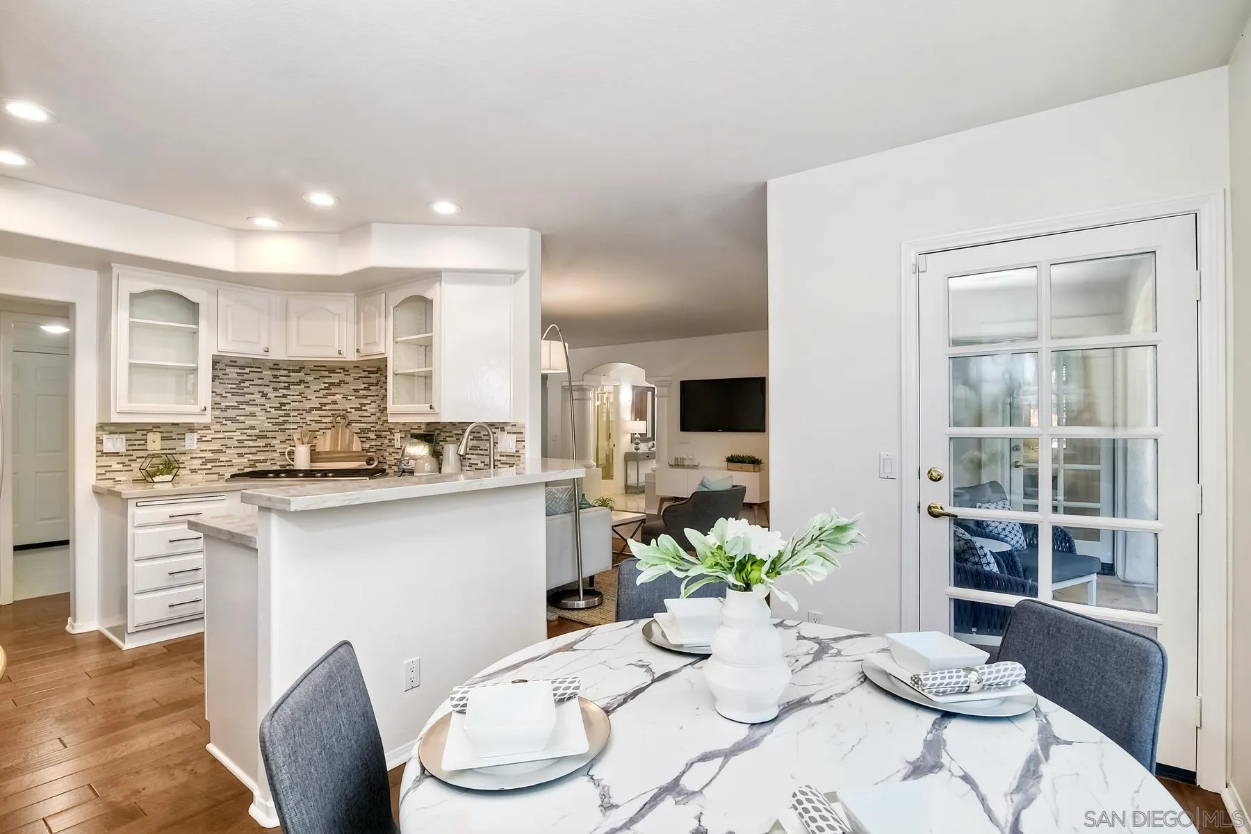 2872 Torrey Pines Road La Jolla, CA 92037 - Photo 12 of 34 a kitchen with stainless steel appliances kitchen island granite countertop a sink and cabinets