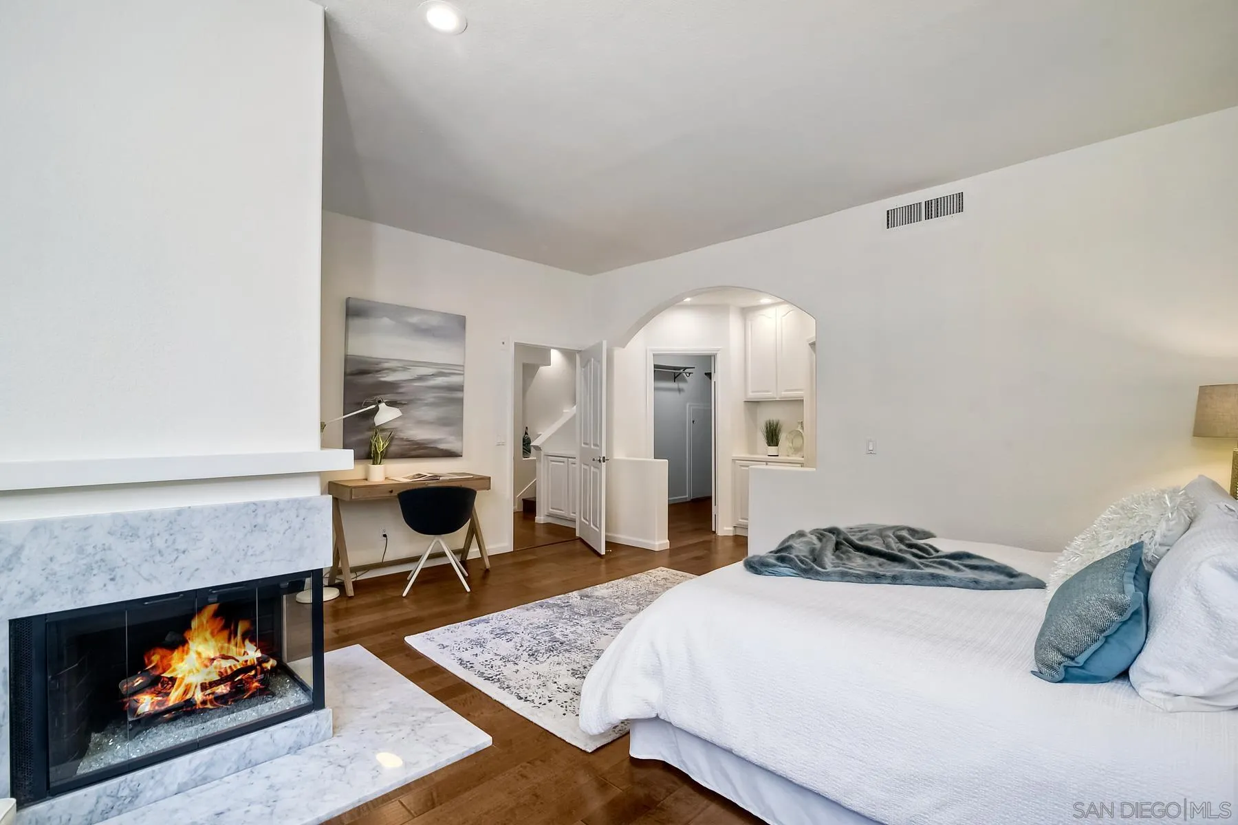2872 Torrey Pines Road La Jolla, CA 92037 - Photo 20 of 34 a bedroom with a bed and a fireplace