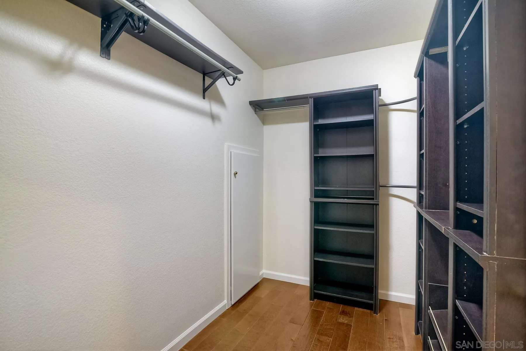 2872 Torrey Pines Road La Jolla, CA 92037 - Photo 22 of 34 a view of walk in closet with empty racks