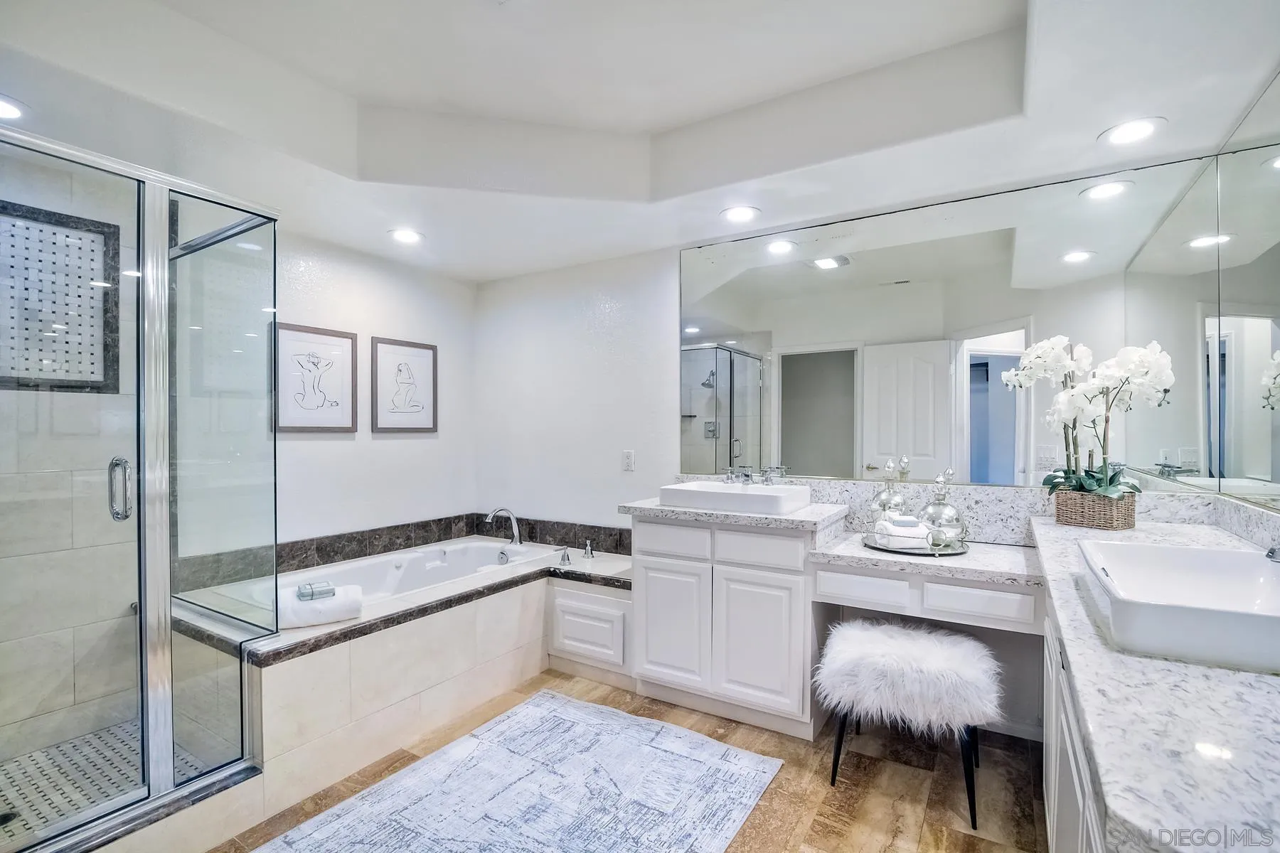 2872 Torrey Pines Road La Jolla, CA 92037 - Photo 23 of 34 a spacious bathroom with a granite countertop sink and a mirror