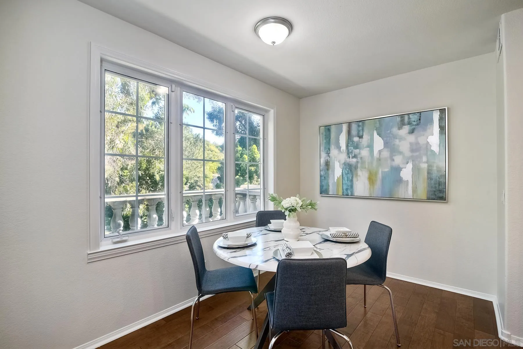 2872 Torrey Pines Road La Jolla, CA 92037 - Photo 8 of 34 a view of a dining room with furniture large window and wooden floor