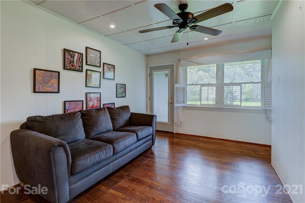 208 Wells Road Canton, NC 28716 - Photo 25 of 35 a living room with furniture and a window