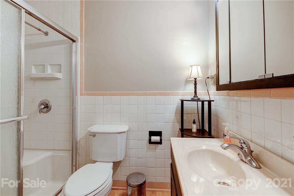 208 Wells Road Canton, NC 28716 - Photo 31 of 35 a bathroom with a sink and a toilet