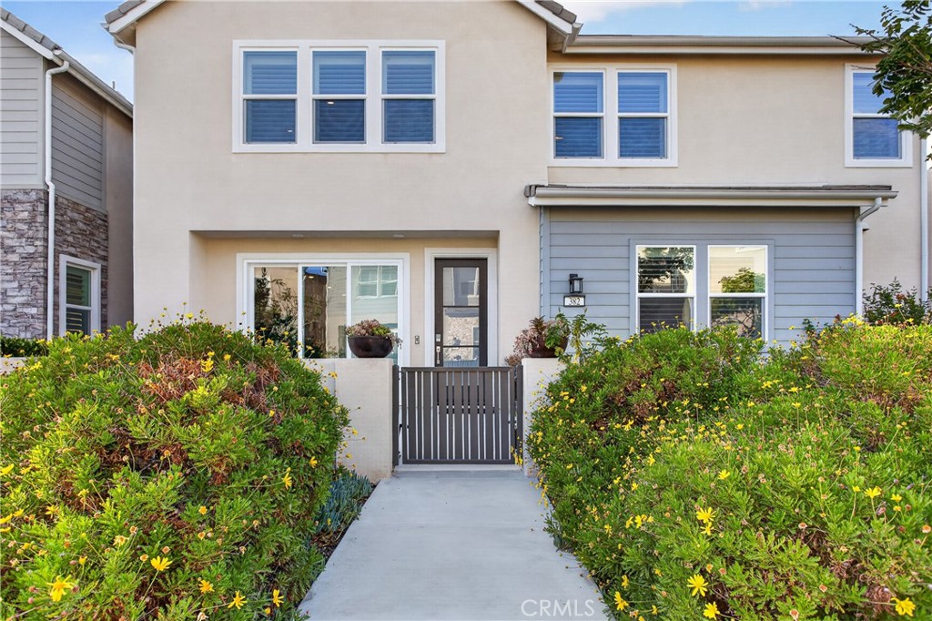 382 Chorus Irvine, CA 92618 - Photo 2 of 38 a front view of a house with a yard
