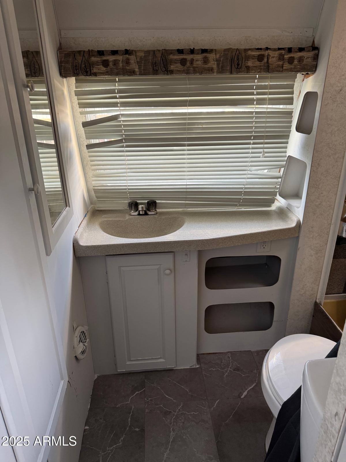 3318 West Madison Street, Unit C Phoenix, AZ 85009 - Photo 5 of 6 a view of washer and dryer