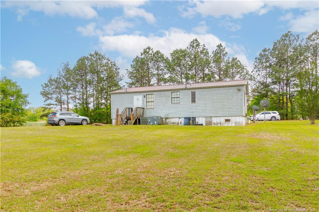 231 Knight Lane Autryville, NC 28318 - Photo 6 of 27 a view of an ocean house swimming pool and outdoor space