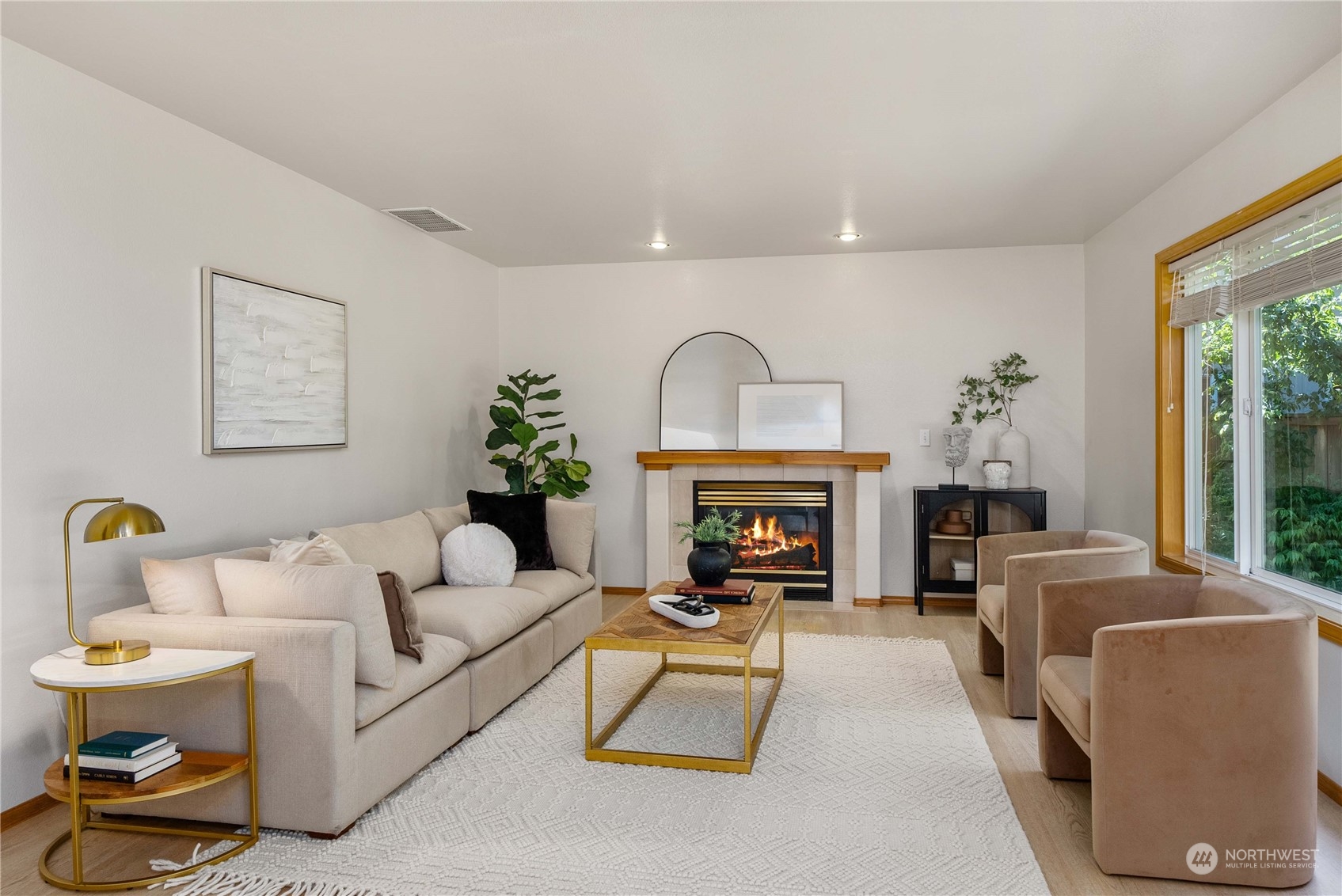 5451 Park Pl Loop Southeast Lacey, WA 98503 - Photo 11 of 36 a living room with furniture and a fireplace