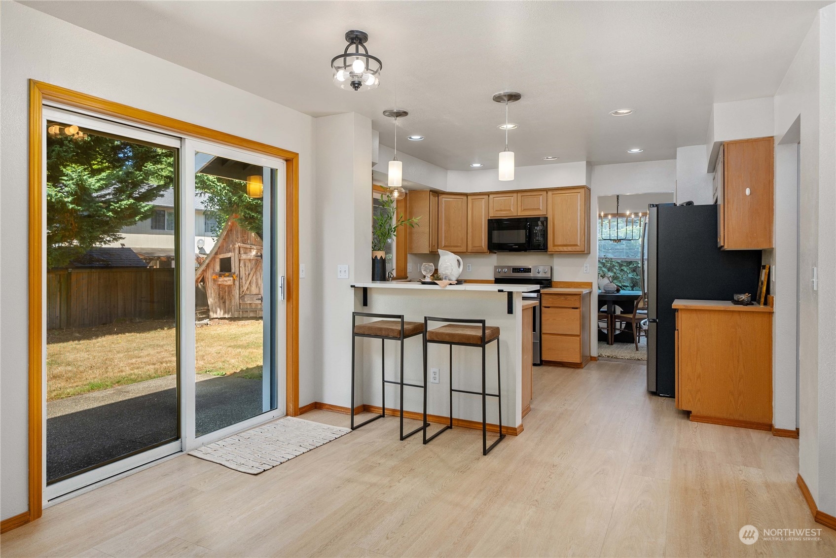 5451 Park Pl Loop Southeast Lacey, WA 98503 - Photo 13 of 36 a view of kitchen with furniture and refrigerator