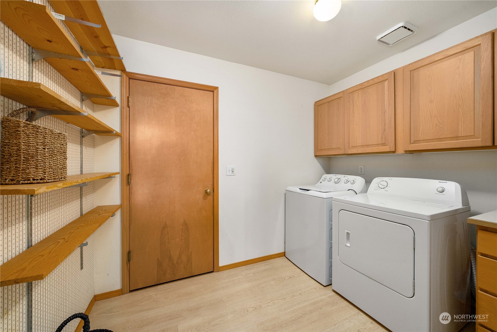 5451 Park Pl Loop Southeast Lacey, WA 98503 - Photo 15 of 36 a utility room with dryer and washer