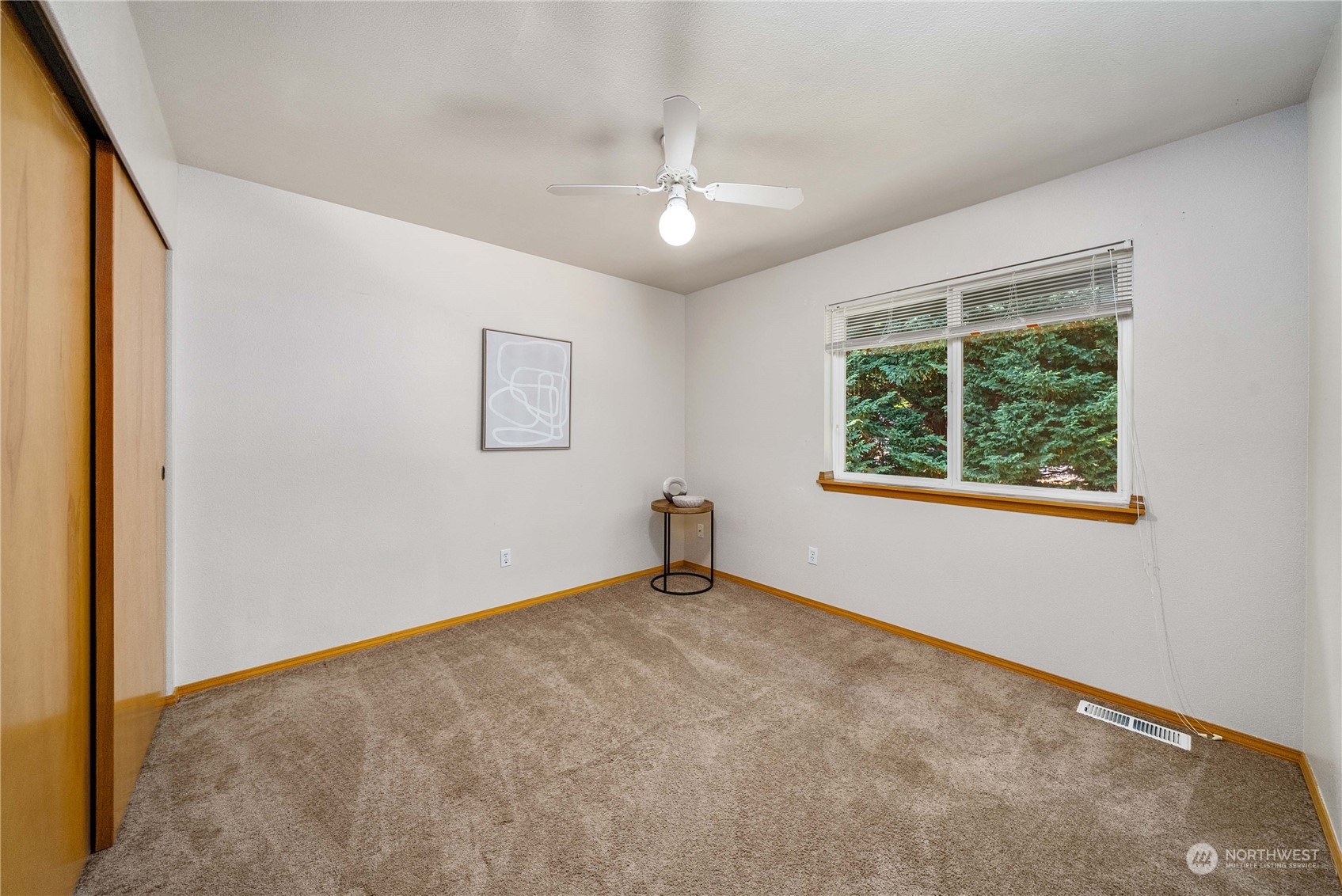 5451 Park Pl Loop Southeast Lacey, WA 98503 - Photo 22 of 36 an empty room with windows and closet