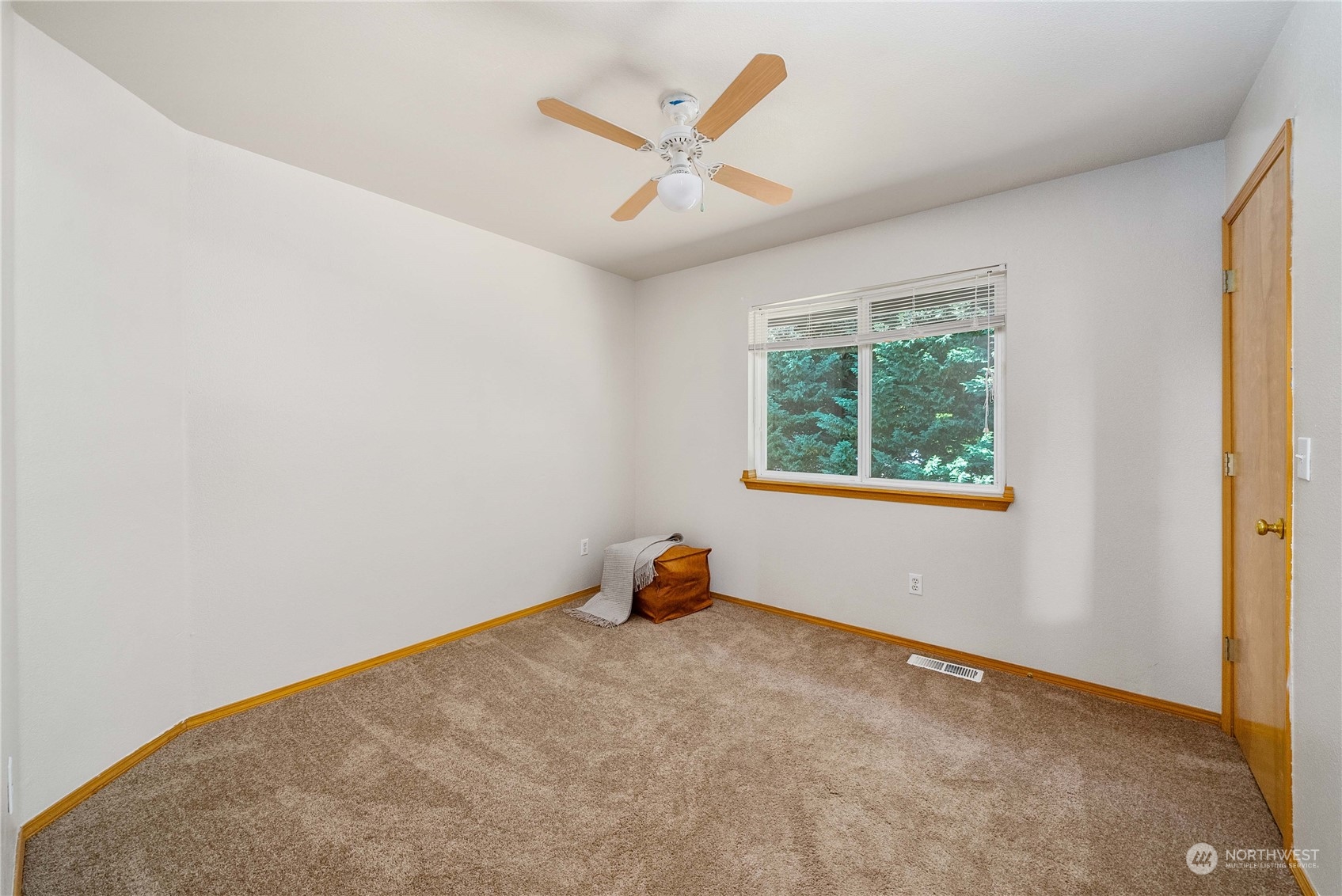 5451 Park Pl Loop Southeast Lacey, WA 98503 - Photo 23 of 36 an empty room with window and ceiling fan