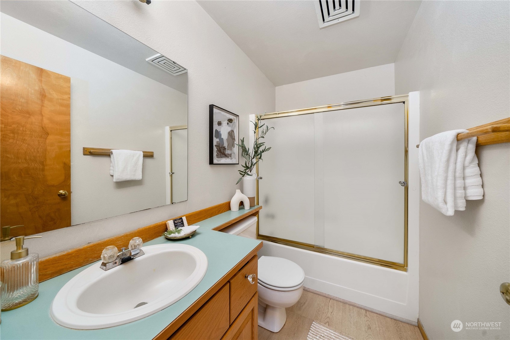 5451 Park Pl Loop Southeast Lacey, WA 98503 - Photo 24 of 36 a bathroom with a sink toilet and shower