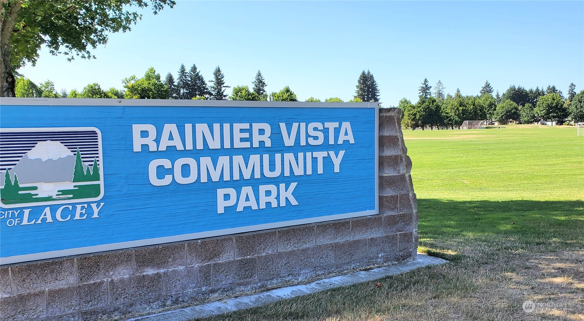 5451 Park Pl Loop Southeast Lacey, WA 98503 - Photo 32 of 36 a view of a sign in a park