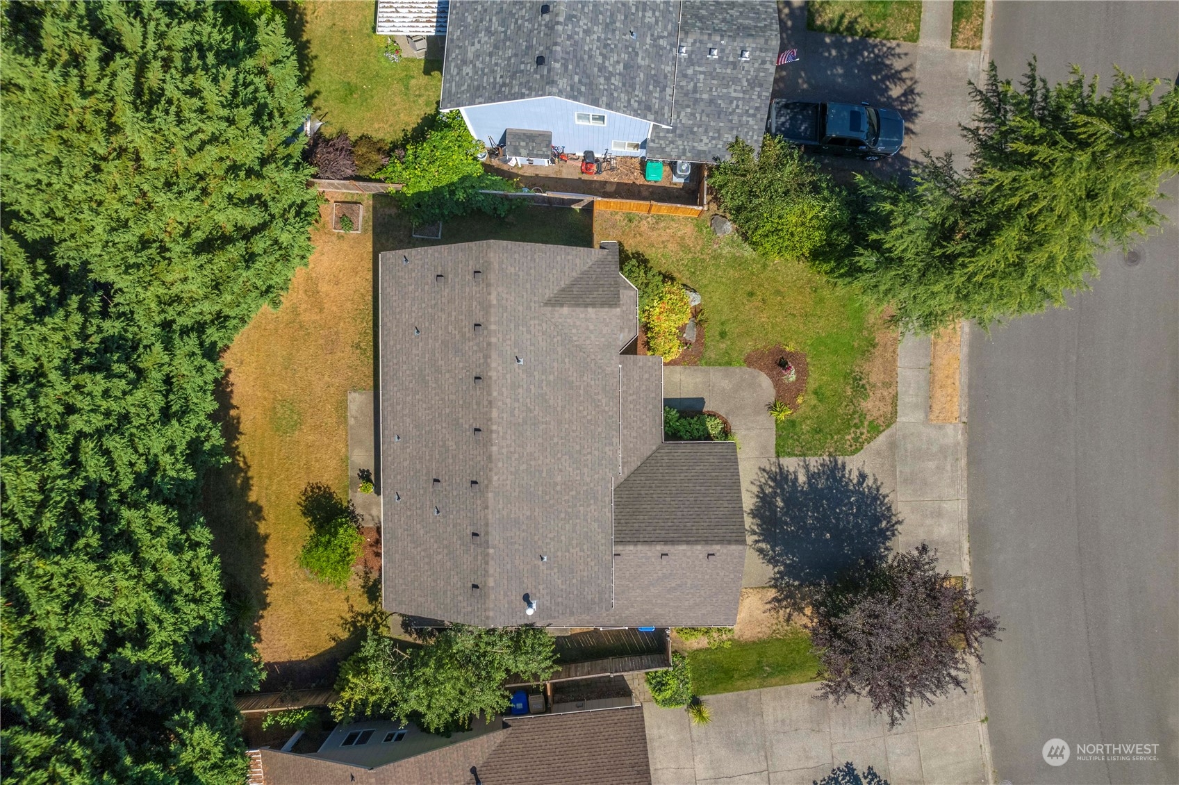 5451 Park Pl Loop Southeast Lacey, WA 98503 - Photo 34 of 36 an aerial view of a house with a yard