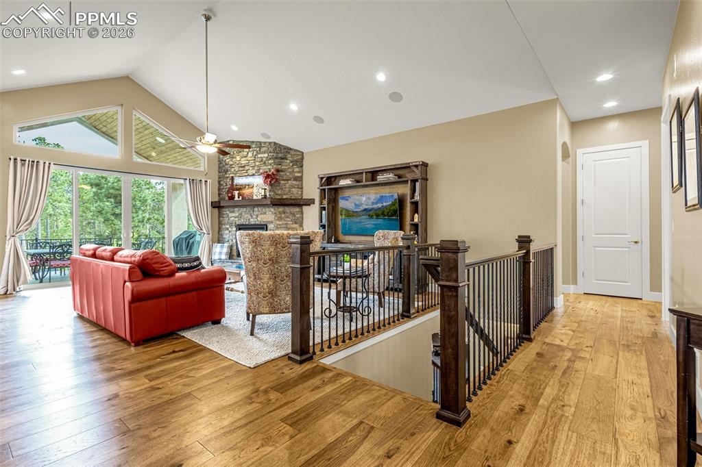 1325 Boldmere Court Monument, CO 80132 - Photo 5 of 49 a living room with furniture windows and a flat screen tv