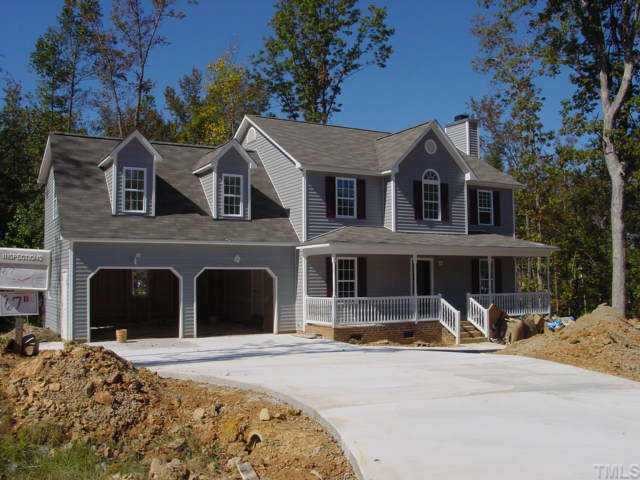 8428 Ridgebury Road Raleigh, NC 27603 - Photo 1 of 1 a front view of a house with yard