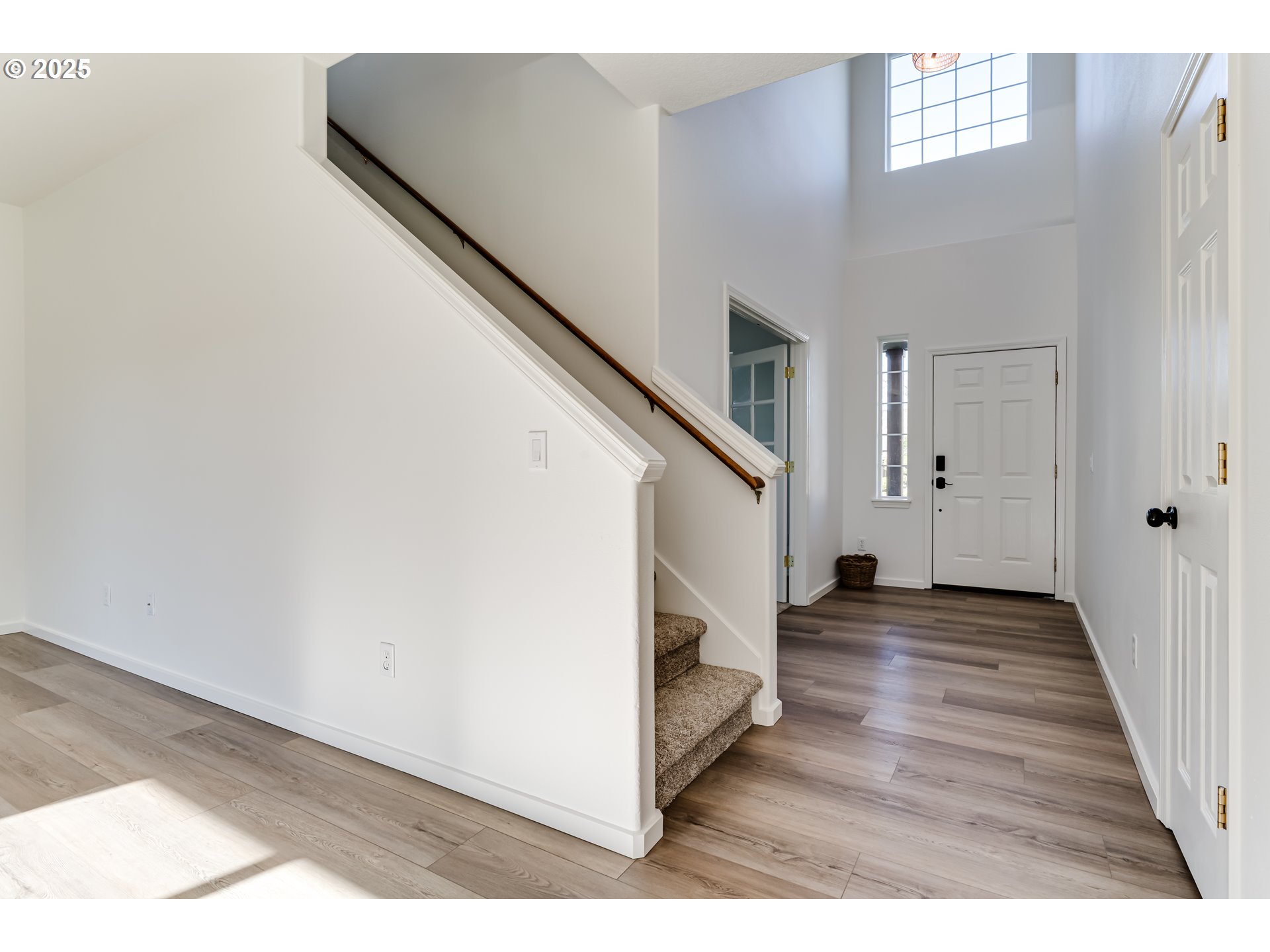 1255 Brower Avenue Eugene, OR 97402 - Photo 13 of 39 a view of a hallway with wooden floor and staircase