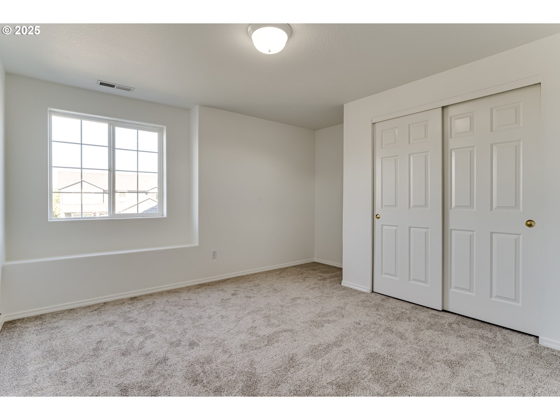 1255 Brower Avenue Eugene, OR 97402 - Photo 15 of 39 a view of an empty room with a window