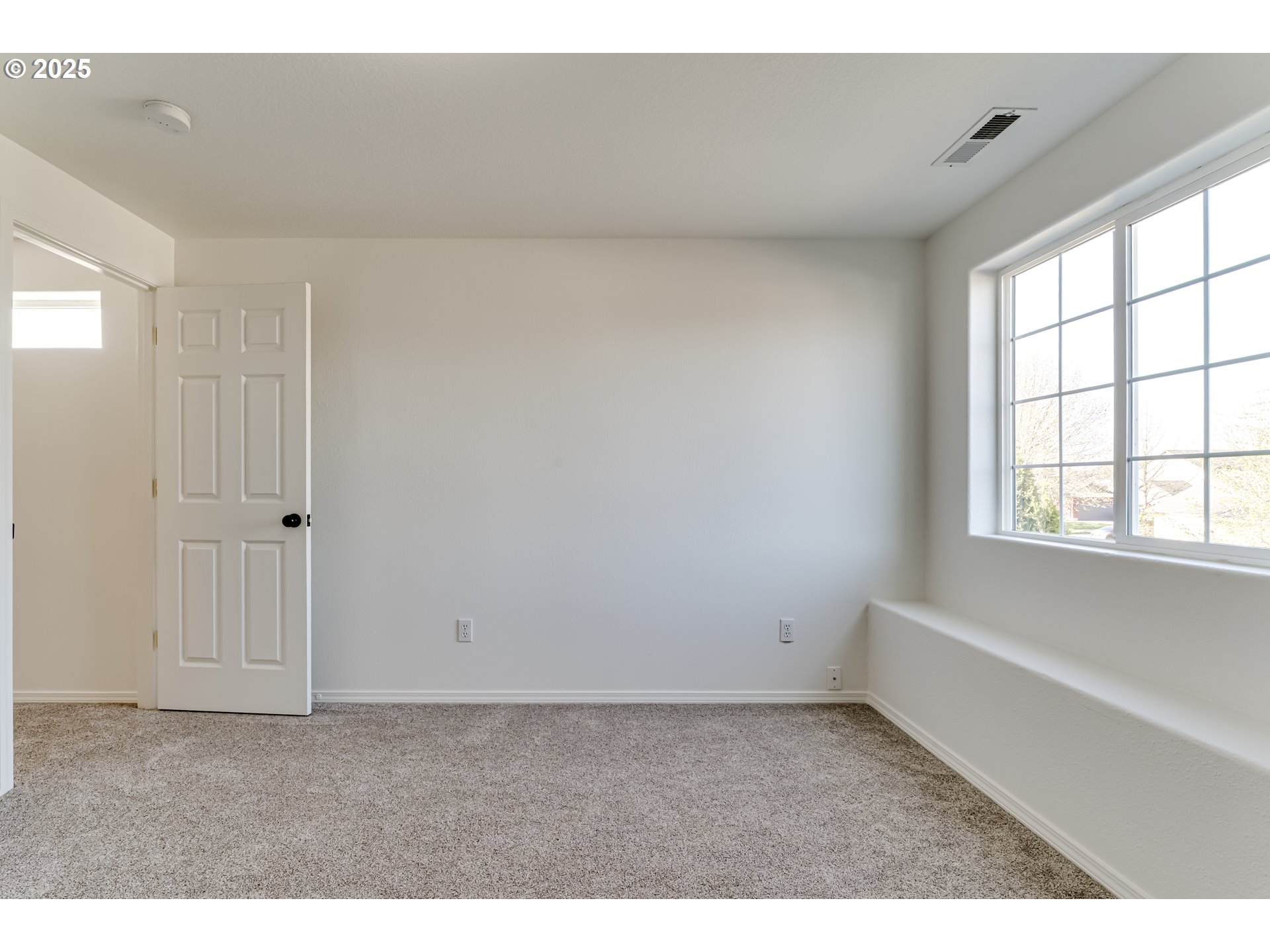 1255 Brower Avenue Eugene, OR 97402 - Photo 17 of 39 a view of an empty room with a window