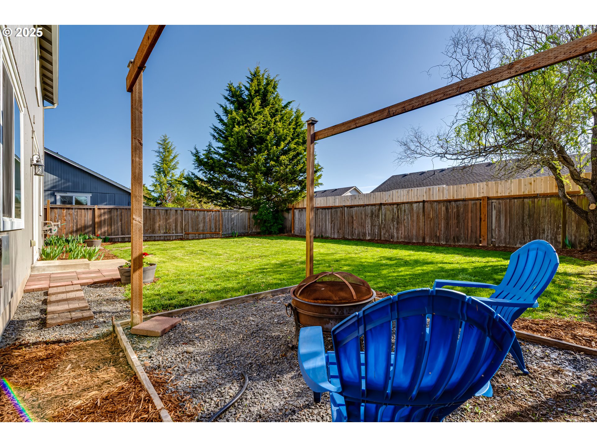 1255 Brower Avenue Eugene, OR 97402 - Photo 35 of 39 a view of a backyard with sitting area furniture and a yard