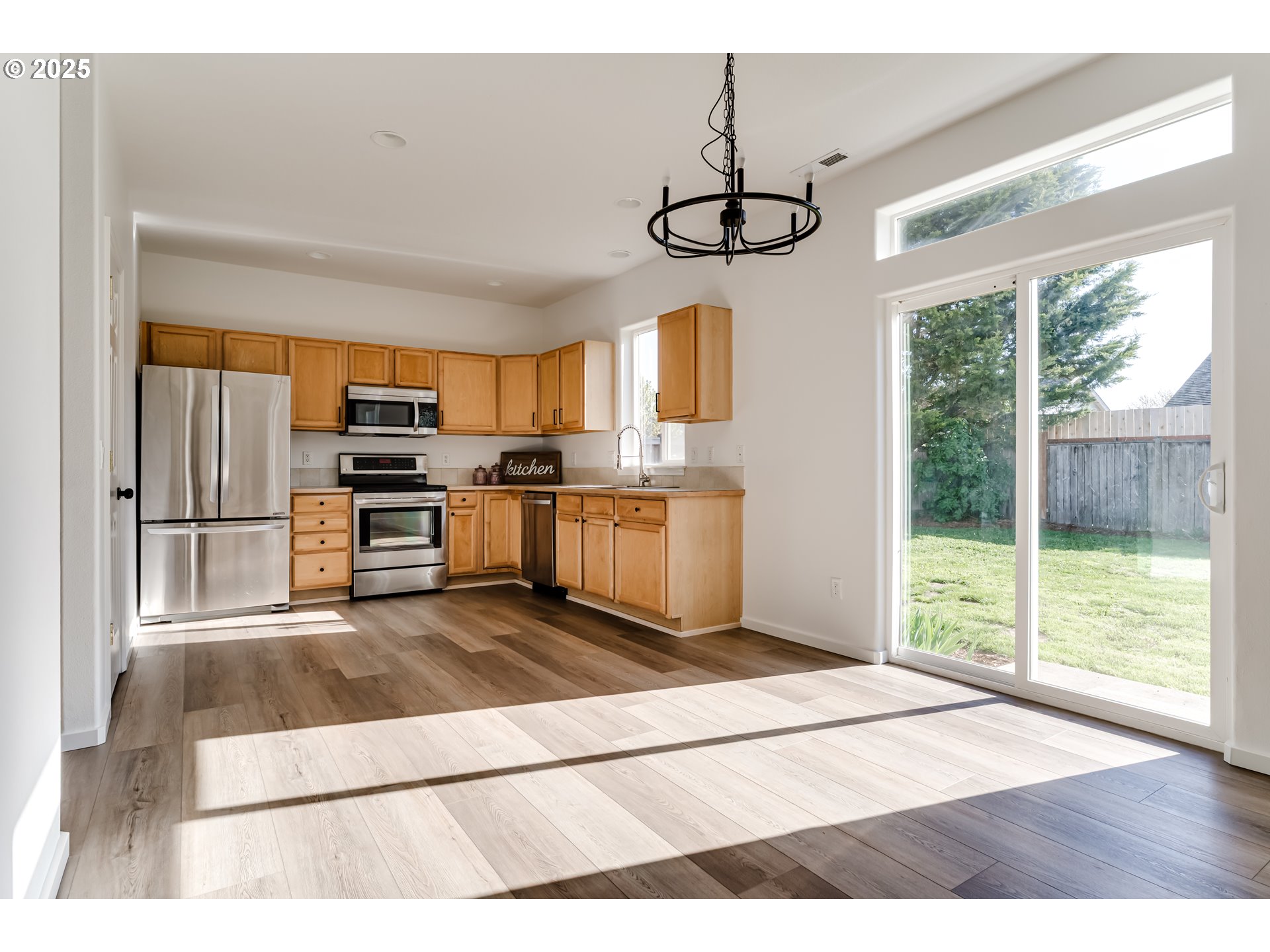1255 Brower Avenue Eugene, OR 97402 - Photo 9 of 39 a view of a kitchen with microwave and stove