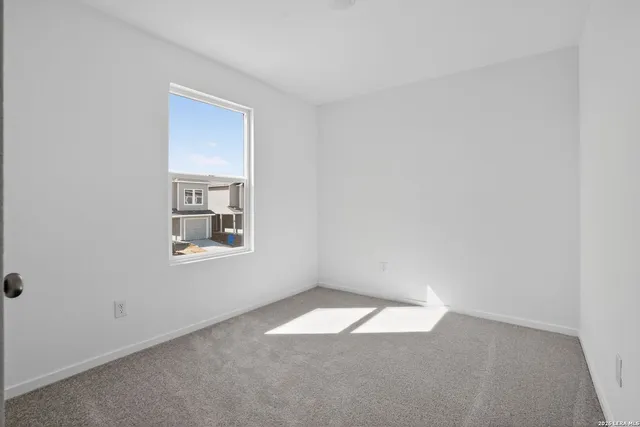 an empty room with a window