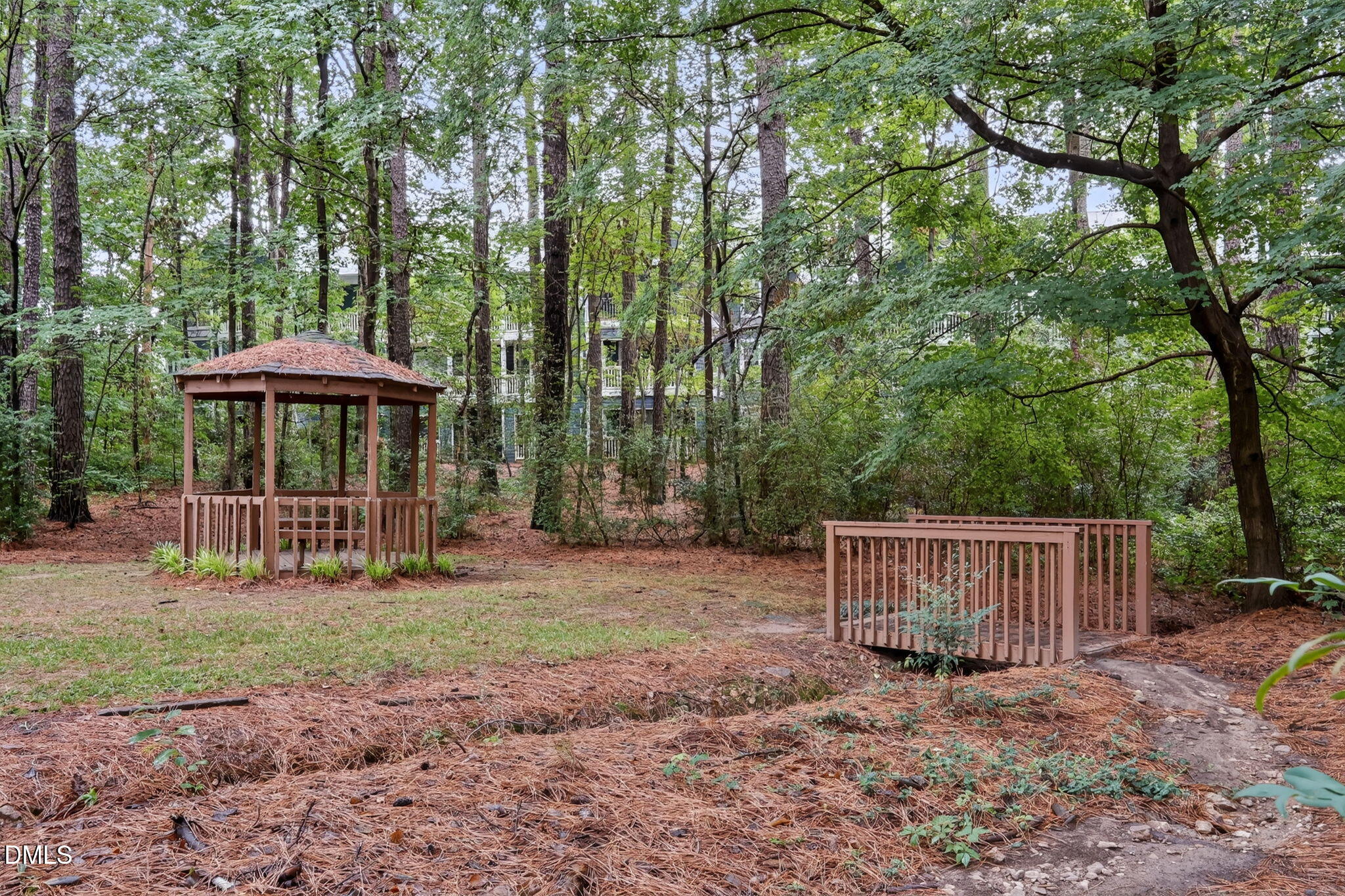 3425 Mill Run Raleigh, NC 27612 - Photo 37 of 40 a view of a wooden deck with a yard