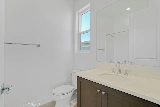 a view of staircase with lots of wooden floor and a window