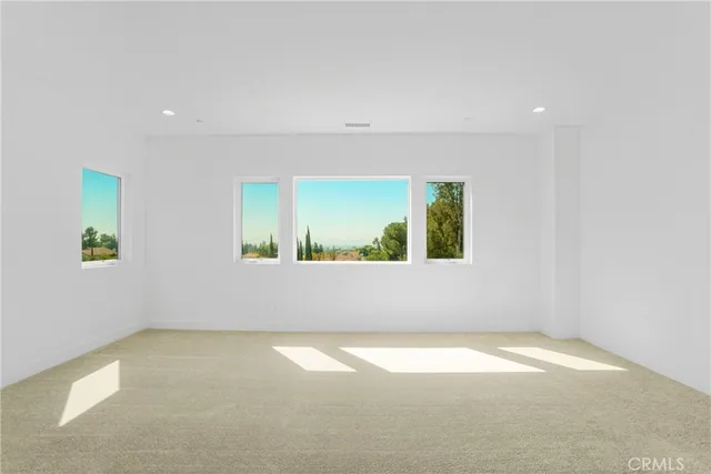 a spacious bathroom with a double vanity sink mirror and double