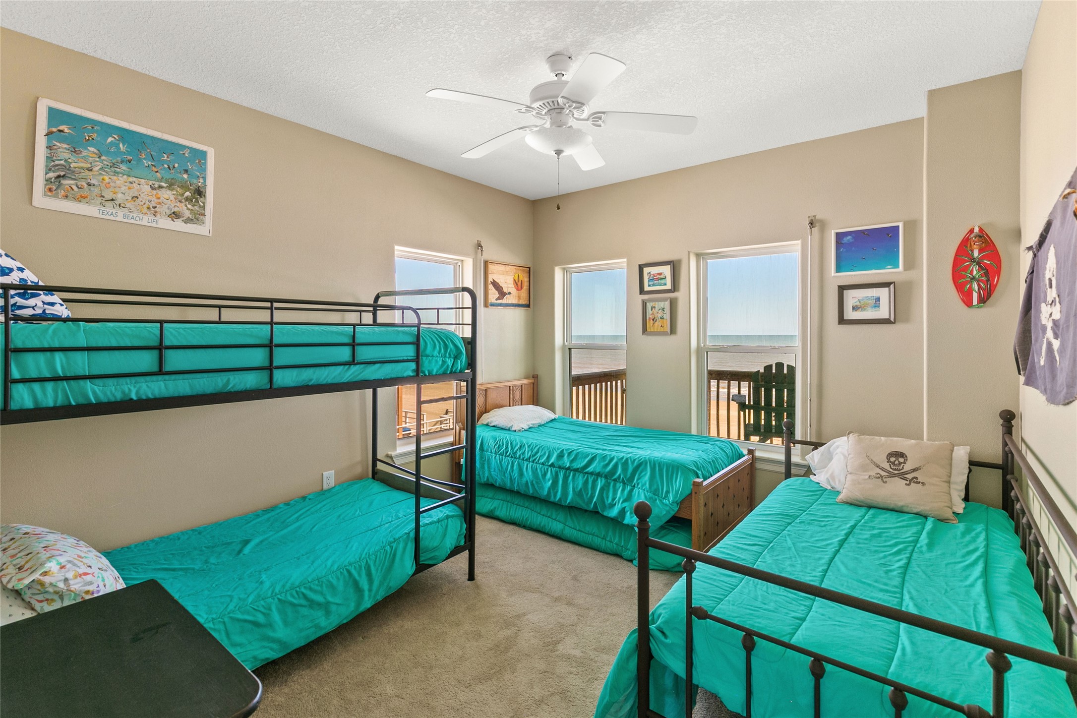 10530 Bluewater Highway Freeport, TX 77541 - Photo 37 of 43 a bedroom with a bed and a baby crib