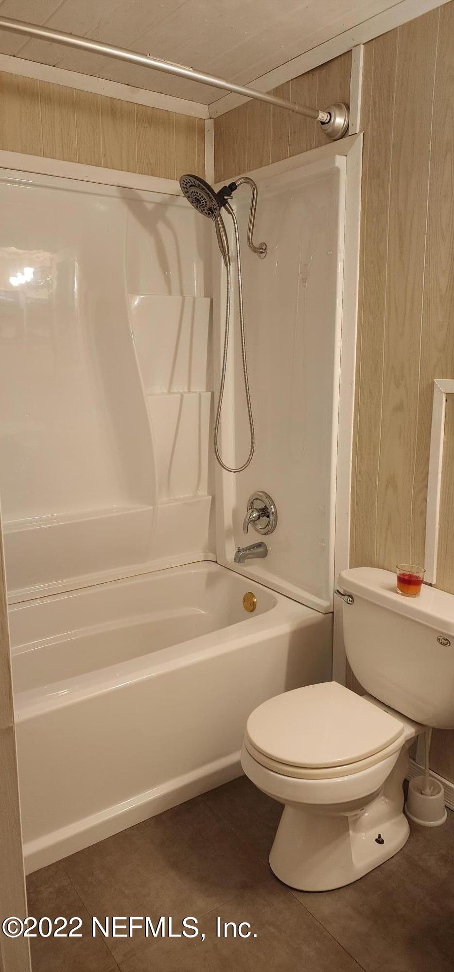 25035 Northeast 131st Place Salt Springs, FL 32134 - Photo 13 of 21 a bathroom with a toilet and a shower