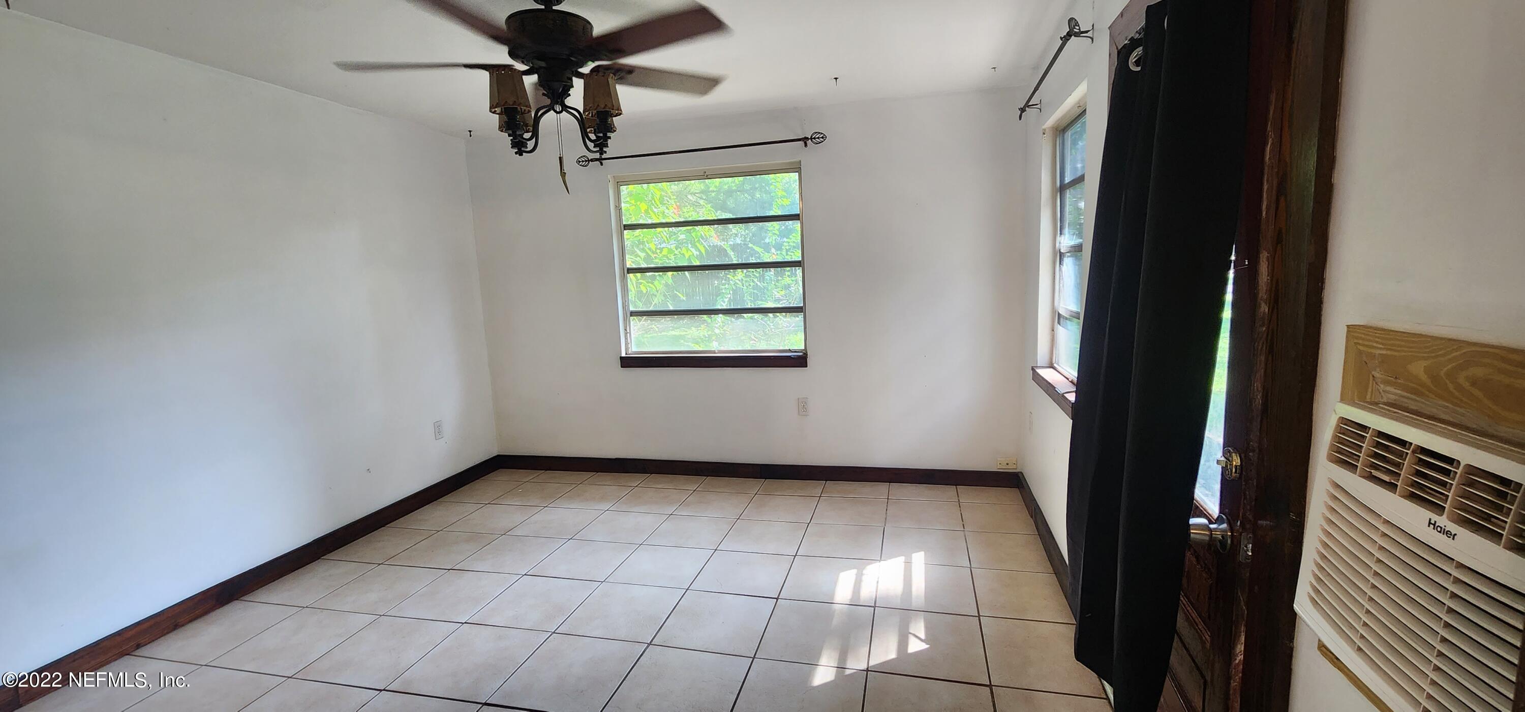 25035 Northeast 131st Place Salt Springs, FL 32134 - Photo 19 of 21 a view of an empty room with a window