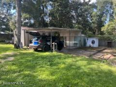 25035 Northeast 131st Place Salt Springs, FL 32134 - Photo 21 of 21 a view of a car park in front of house
