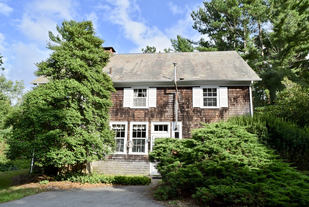 498 A Point Road Marion, MA 02738 - Photo 1 of 12 a aerial view of a house