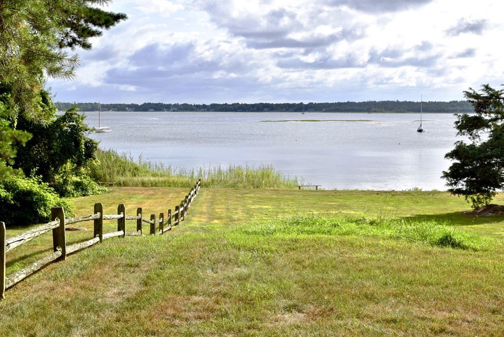498 A Point Road Marion, MA 02738 - Photo 10 of 12 a view of a lake with a big yard