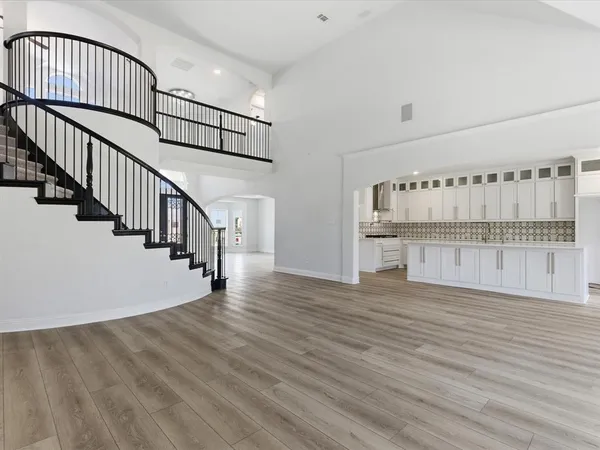 a view of entryway with wooden floor
